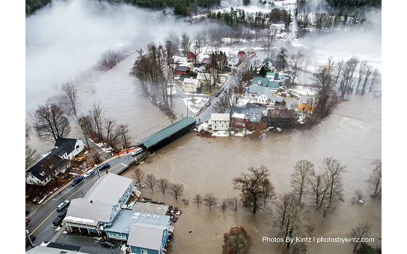 Aerial image of Waitsfield Village and Covered Bridge flooding December 18. Photo: Photos by Kintz