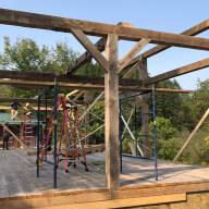 Barn raising underway at Featherbed Inn in Waitsfield